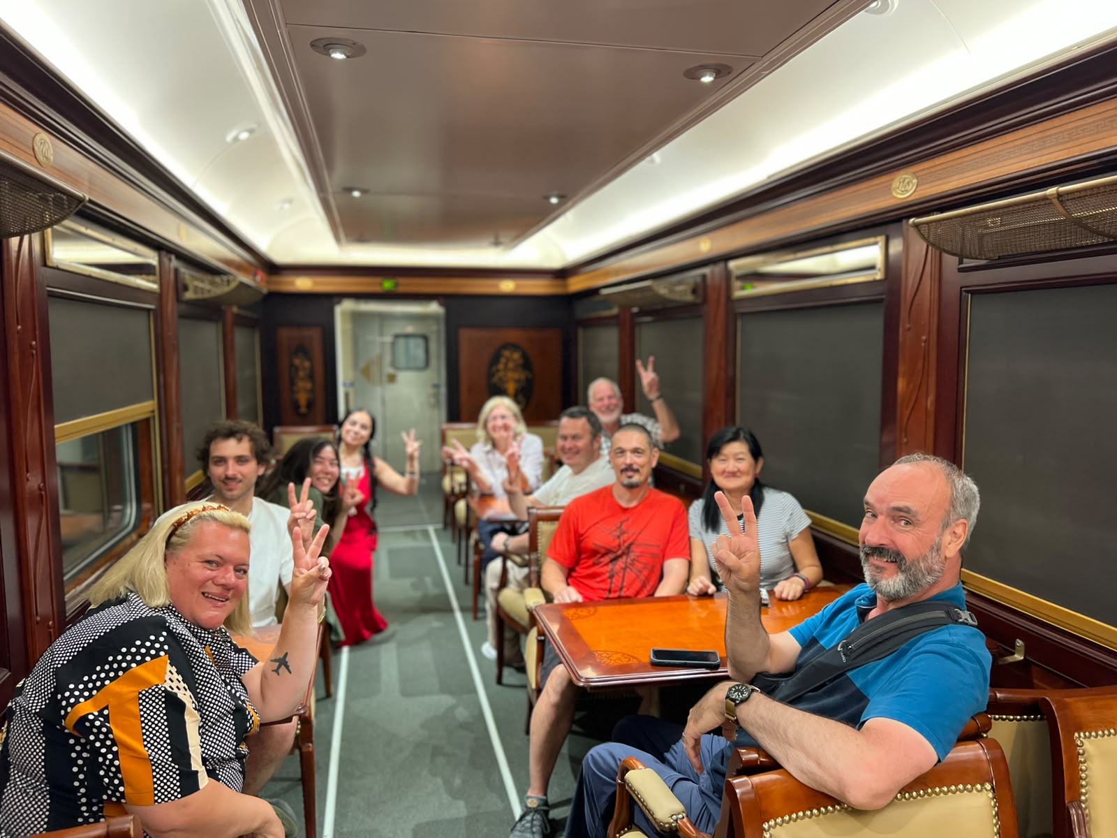 Guests dining in the Abela Elite Sleeper Train restaurant car