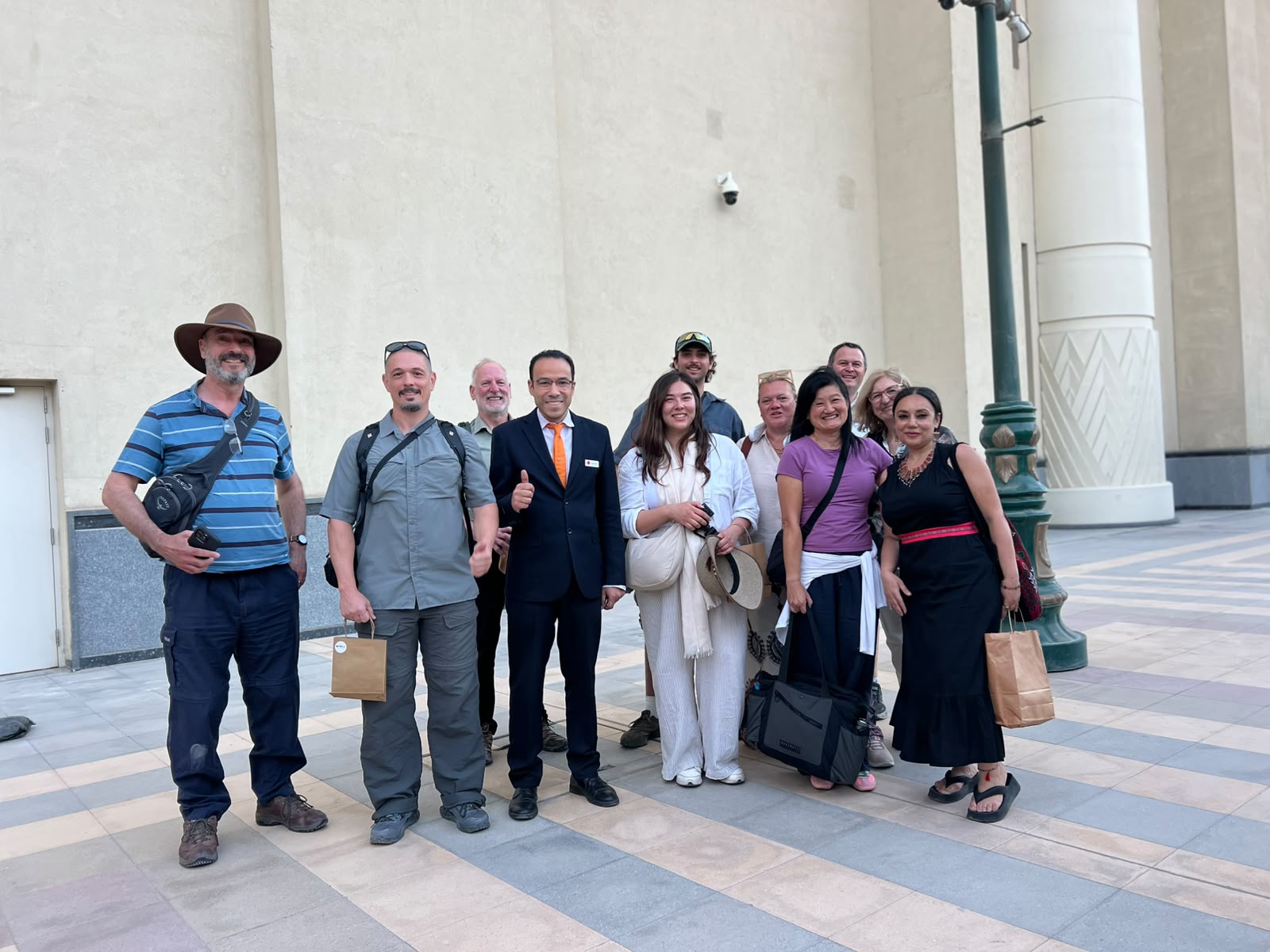 Travellers with the Amisol team at the railway station