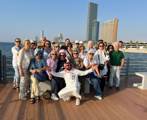 Guests on the Jeddah waterfront at sunset