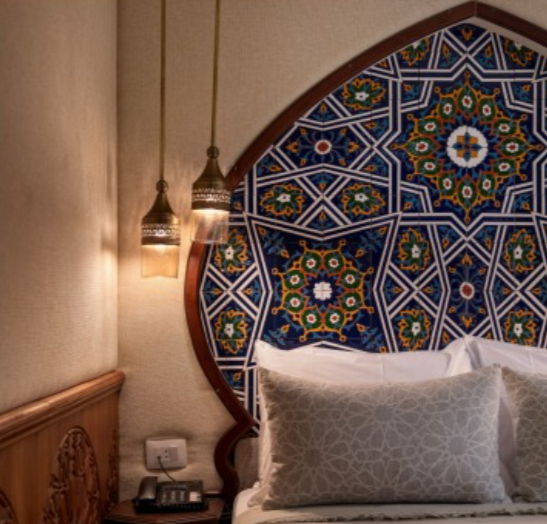 Hand-tiled headboard detail