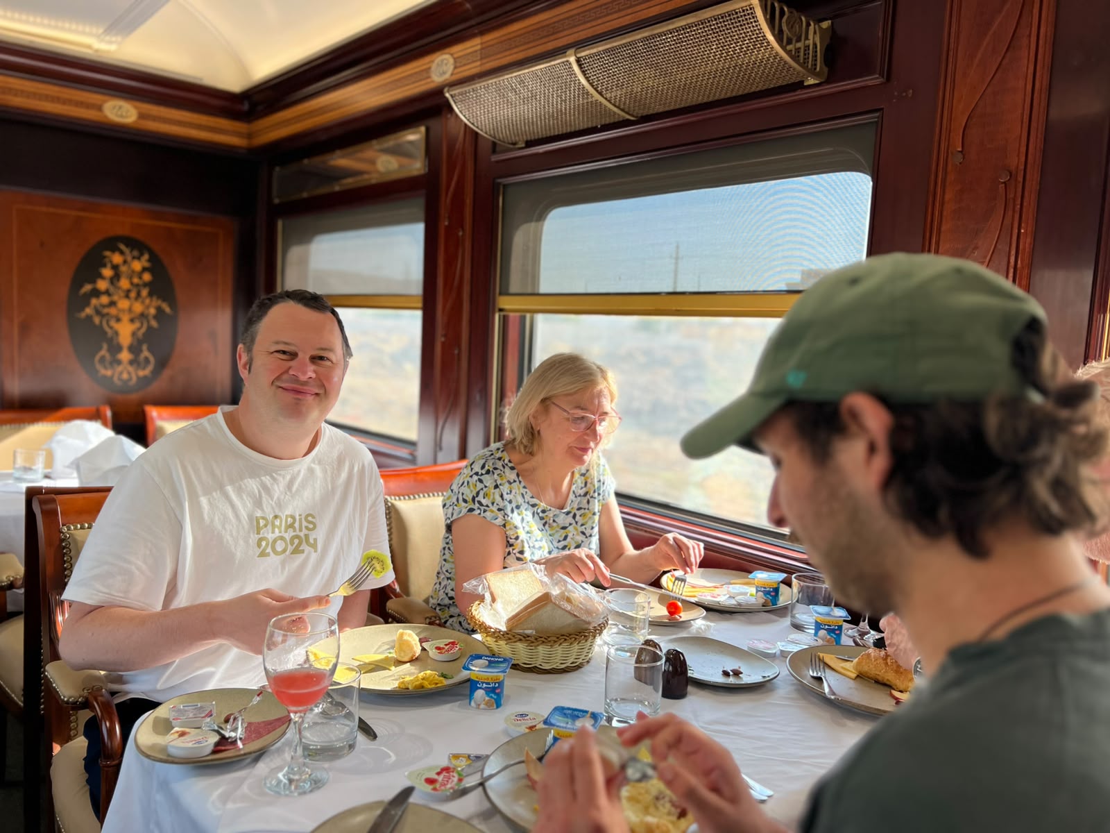 Guests enjoying breakfast in the Abela Elite Sleeper Train dining car