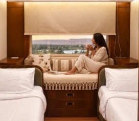 Window seat between twin beds in a Main Deck Twin cabin aboard Q-Nile